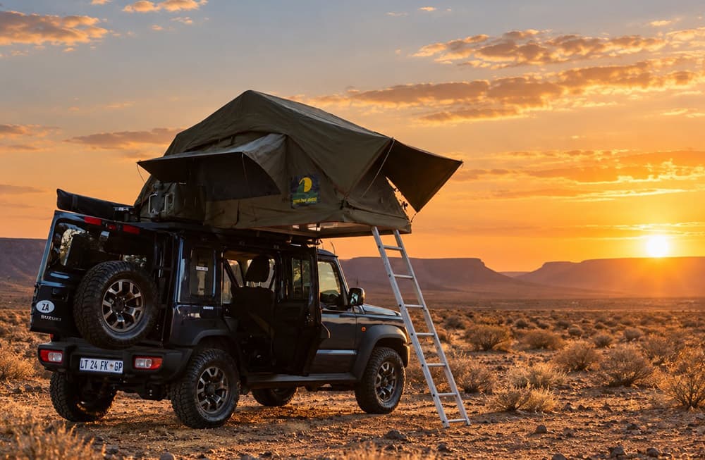 Rooftop tent set up on the Jimny